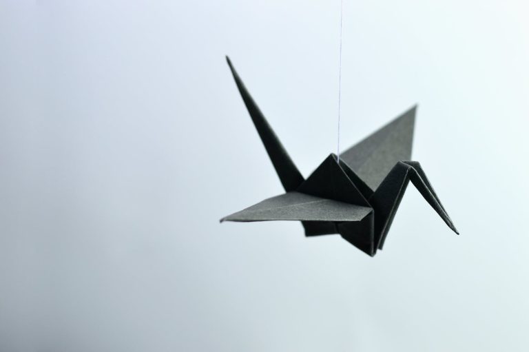 Shallow Focus Photography Of Paper Crane